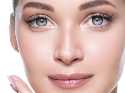 Clean skin grey eyes woman face macro