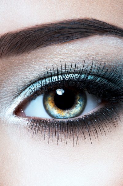 Woman's eye with blue eye makeup